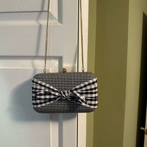 Black and white gingham bag with gold chain strap